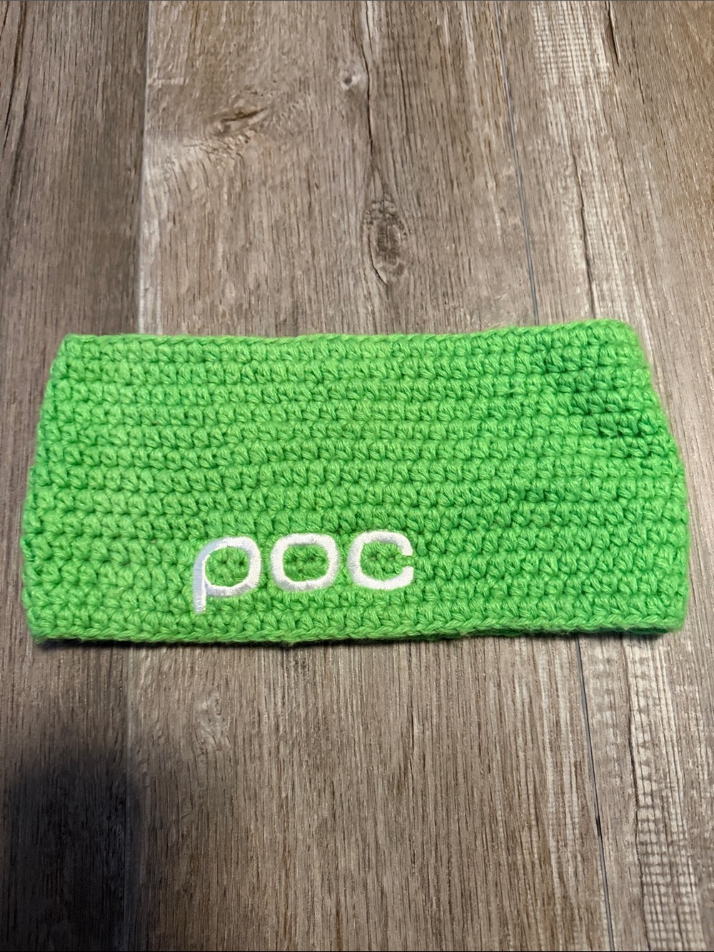 POC Crochet Headband featuring the distinctive white POC logo